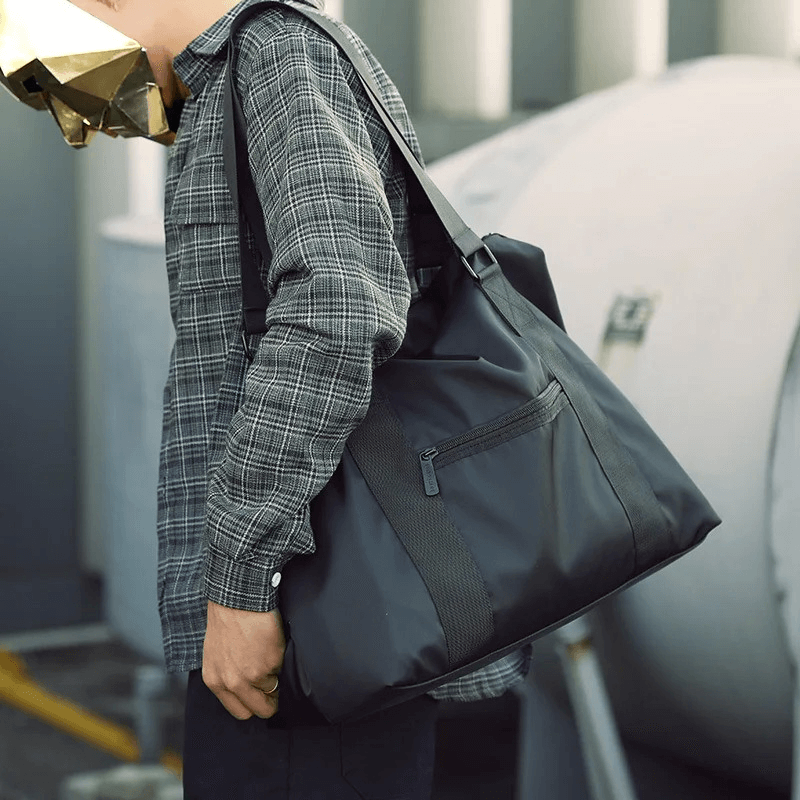 Black nylon crossbody shoulder travel bag SF1959, perfect for men, outdoor activities, with 20-35L capacity and zipper closure.
